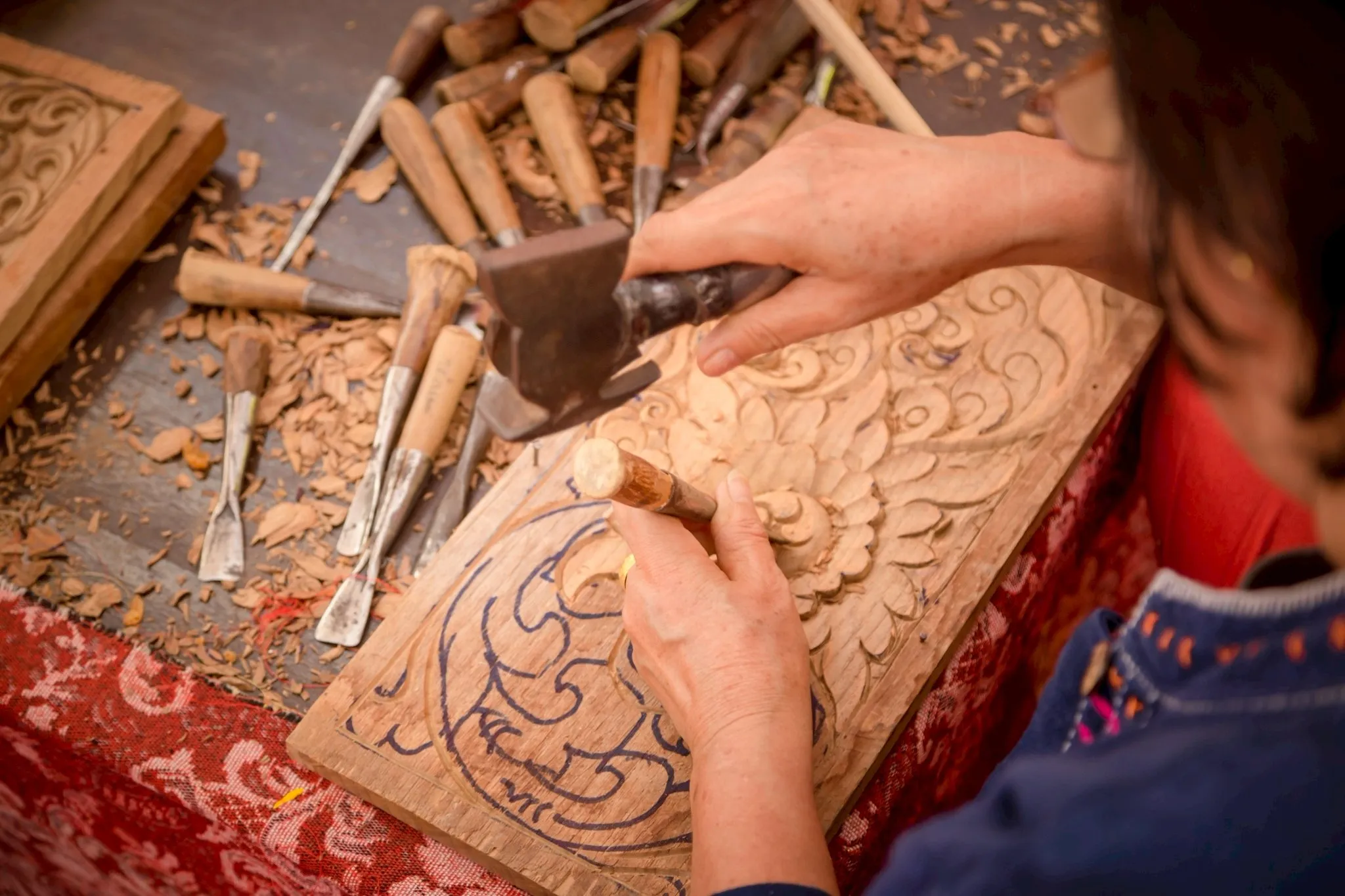 Chiang Mai artisan showing traditional woodworking