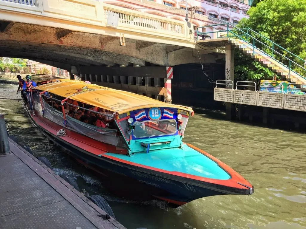 Passenger boat at Chidlom pier on San Sab canal in Bangkok.