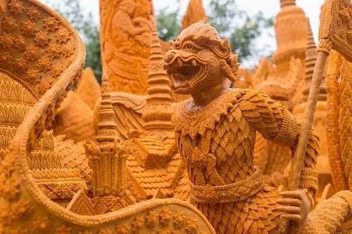 Mythical dieties from Buddhist lore carved from candlewax.