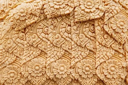 An intricate pattern formed onto candlewax.