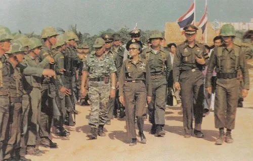 Her Royal Highness Princess Srinagarindra walking with the Thai army.