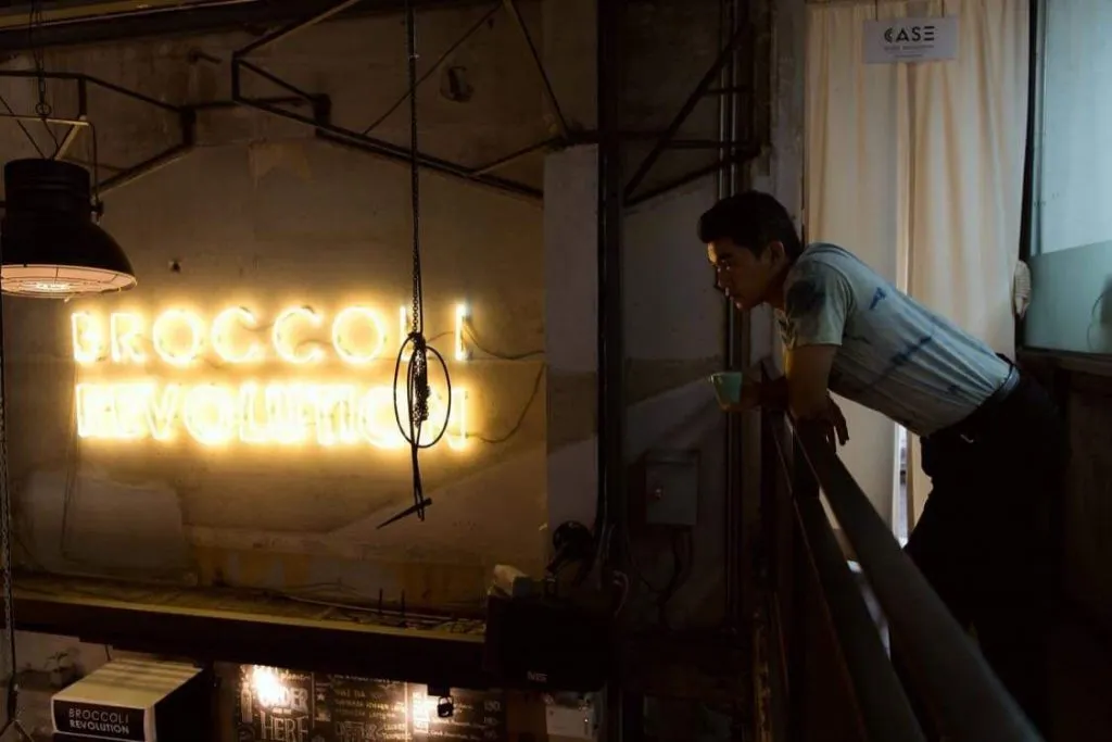 Sakson overseeing his vegan restaurant, Broccoli Revolution.