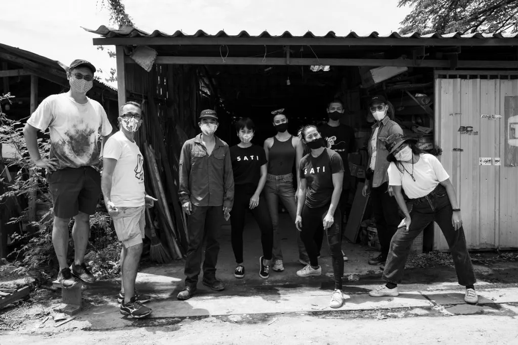 A team photo of SATI foundation staff and several partner entities.