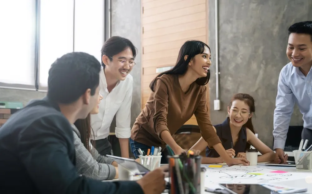Group of coworkers having a team meeting and working on a project