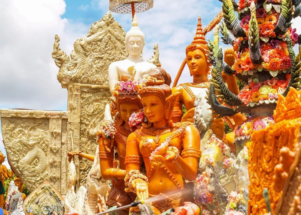 Carved candles on the candle float parade at the candle festival in Ubon Ratchathani province, Thailand