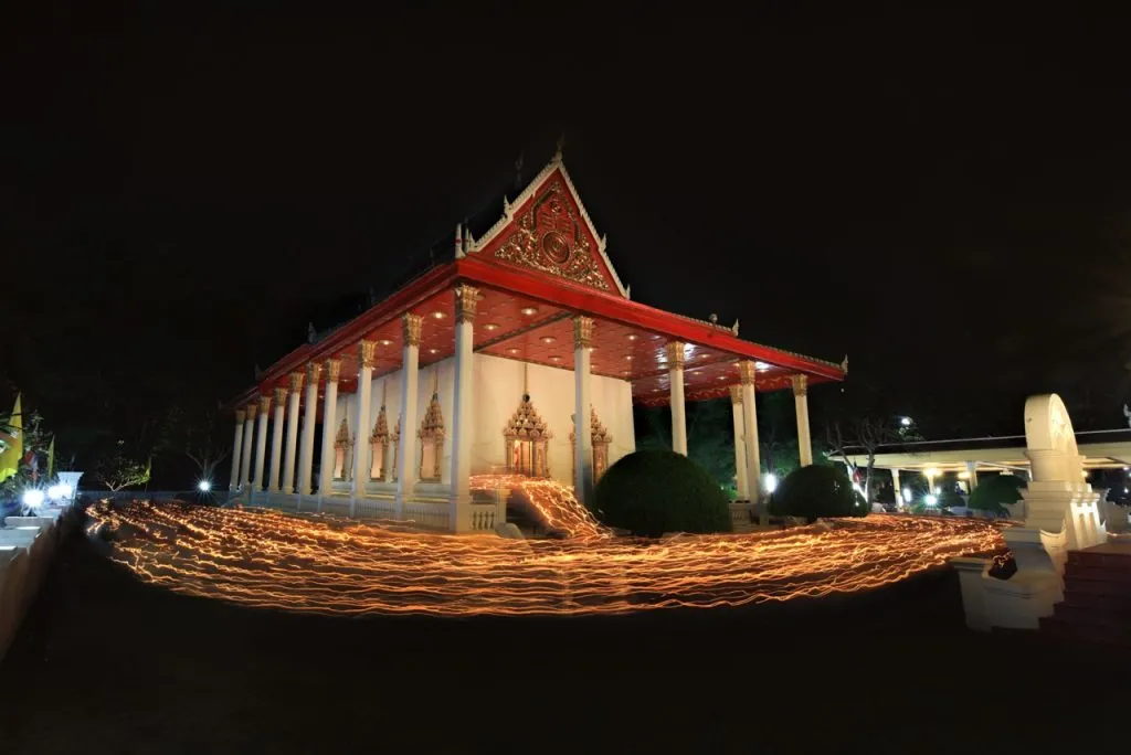 Wian tian or a circumabulation procession around the ordination hall in the evening of Asalha Bucha Day