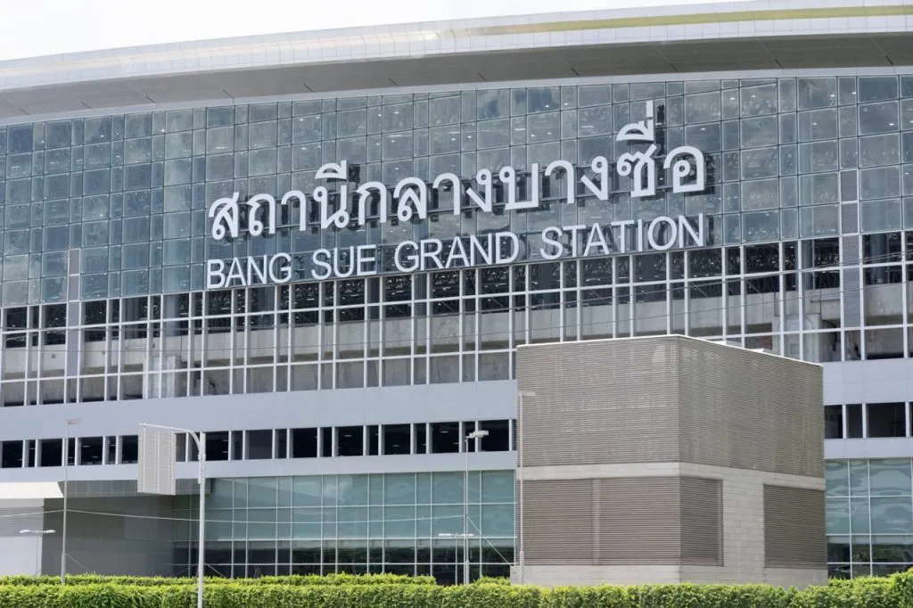 Bang Sue Grand Station sign which is large and visible in both Thai and English.