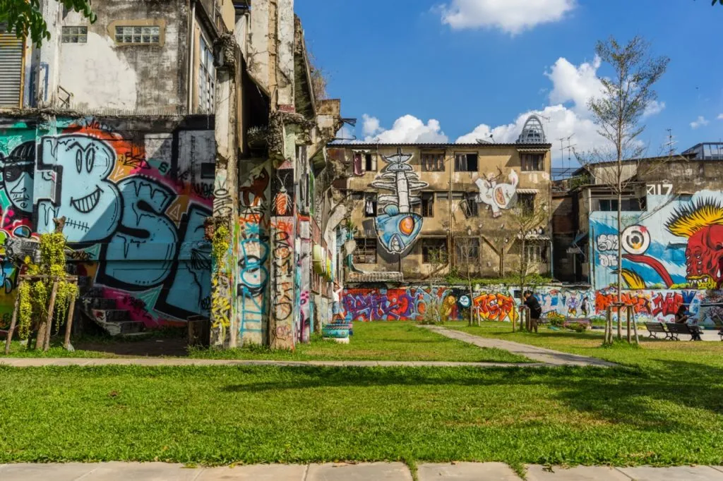 The graffitied buildings at Chaloemla Park by the Ratchathewi BTS Station in Bangkok.
