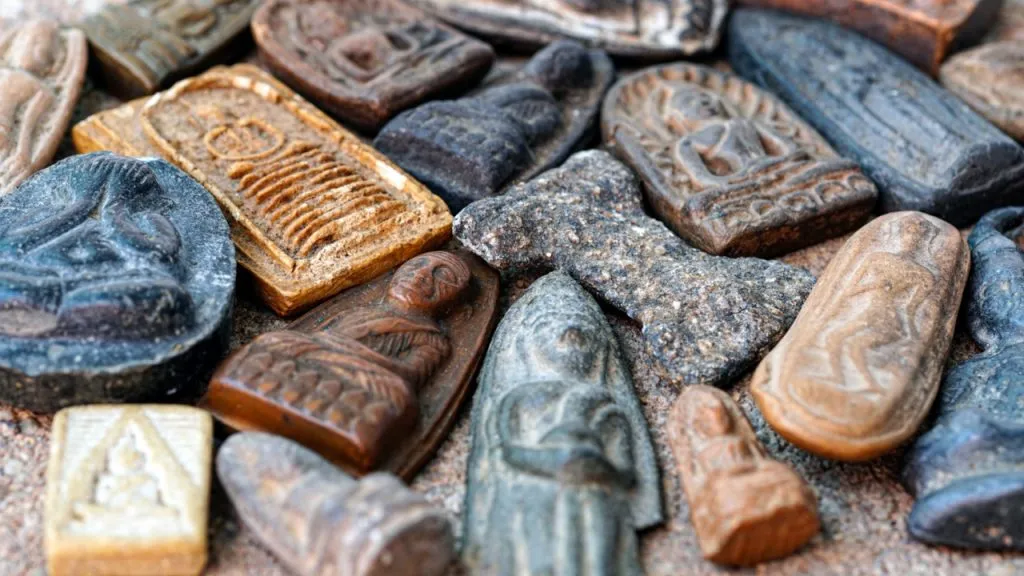 Thai Buddhist amulets in a wide variety of colors and styles