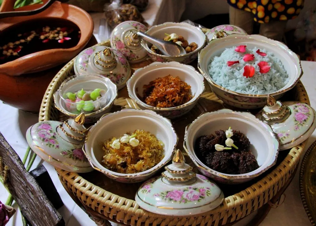 A dish of rice soaked in water. Khao Chae, with many selection of Chinese-influenced dishes