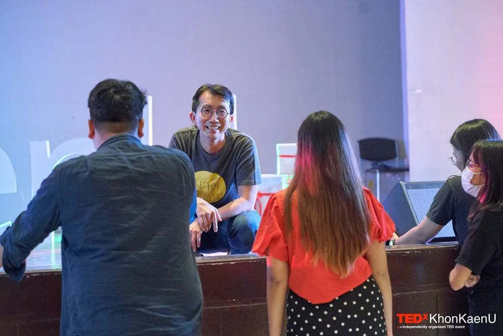 Poa talking with the team at TEDx KhonKaenU