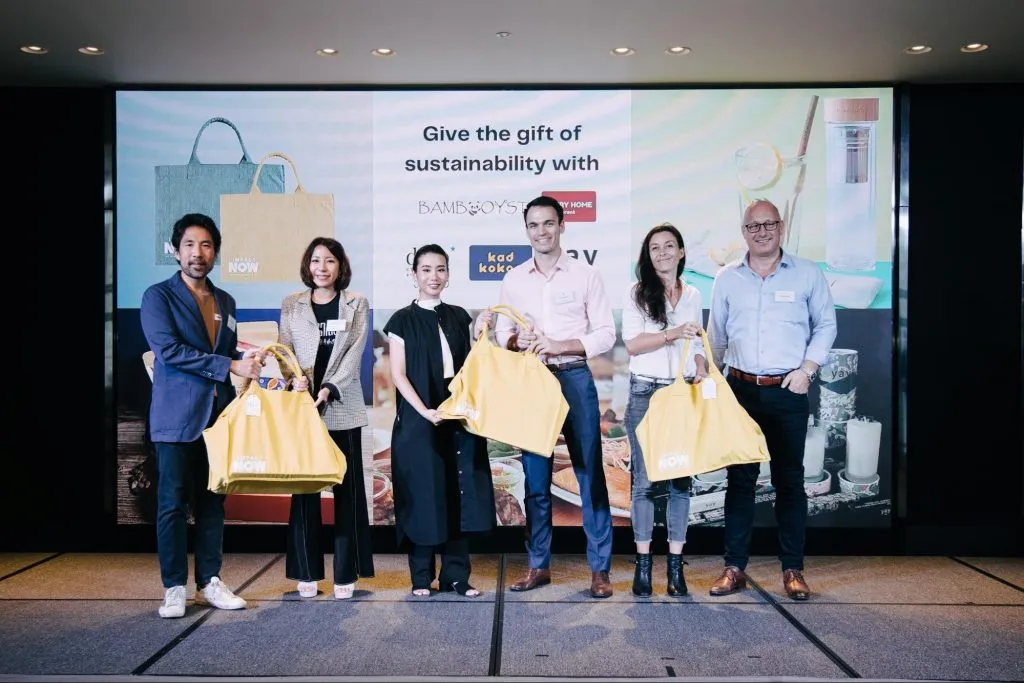 Magali du Parc-Crosta, Executive Director of Baan Dek Foundation & Founder of Dao Ethical Gifts giving prizes out to lucky draw winners of Impact NOW