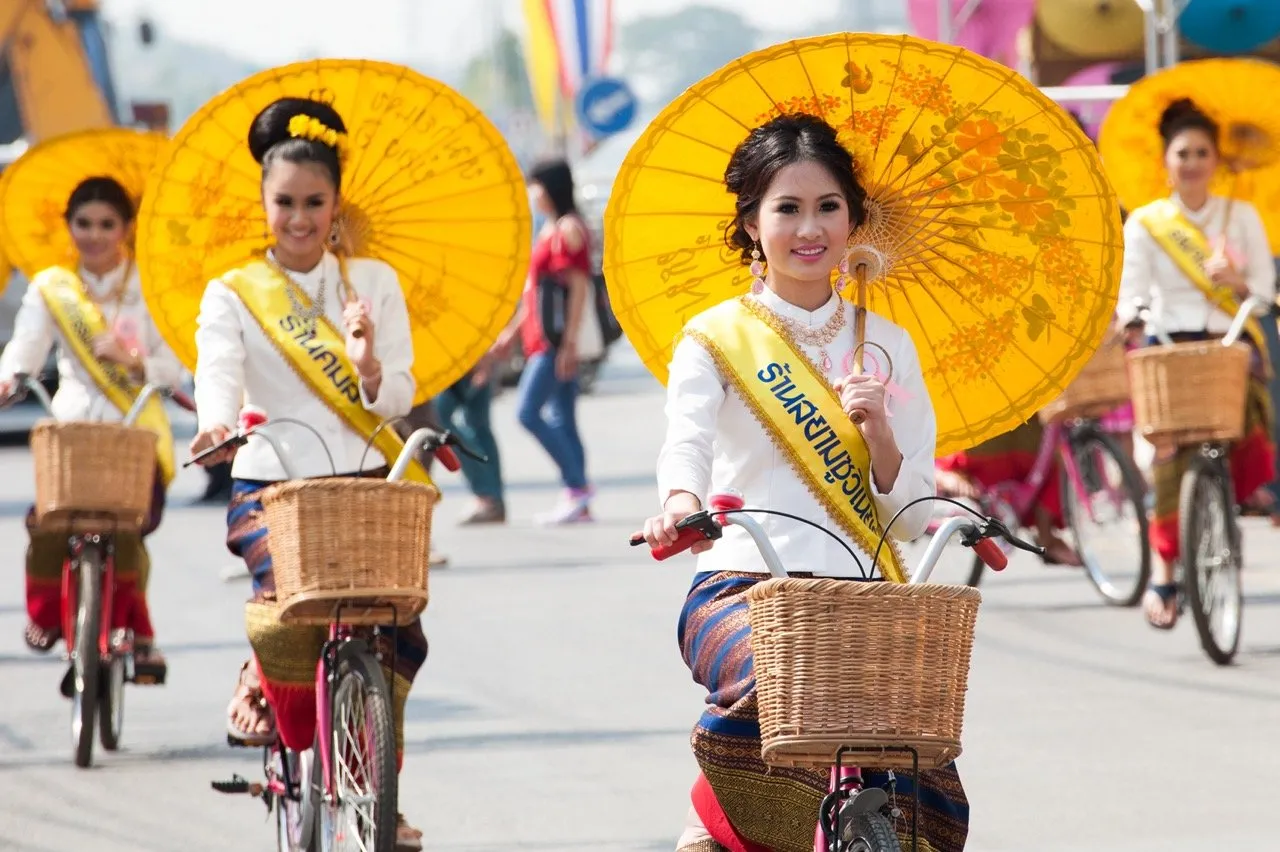 Women wearing traditional costume during the 30th year of Bo Sang Umbrella Festival in 2013