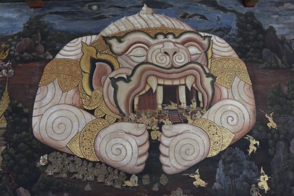 Mural at the Grand Palace, Bangkok of Hanuman in his giant form sheltering Ramas camp