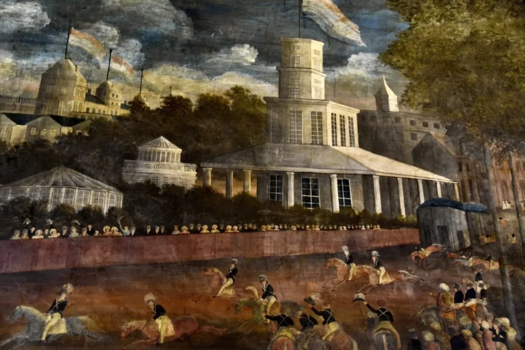 Murals in Wat Borom Niwat Bangkok depicting horse racing an allegory for Buddha his teachings and the clergy