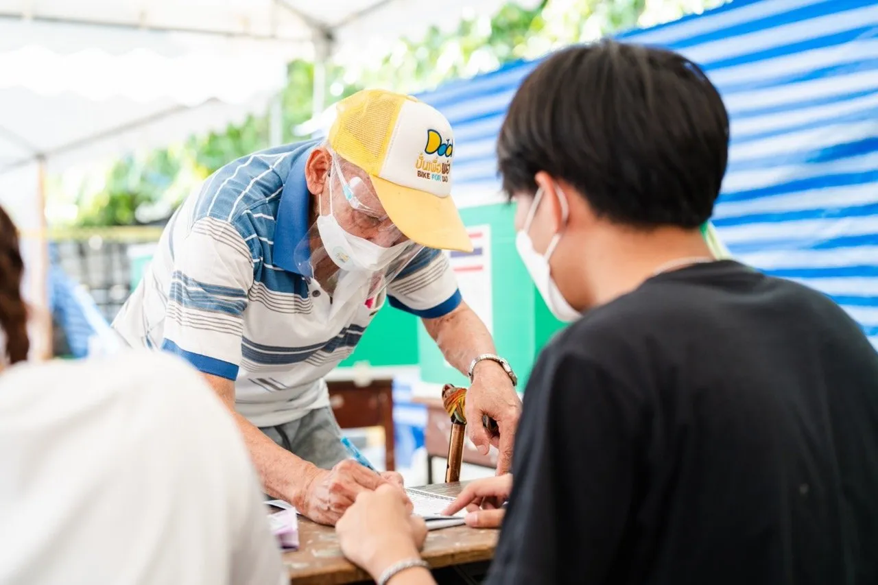 An elder at a polling station to cast their vote in 2023