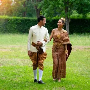 A couple wearing Thai traditional clothing