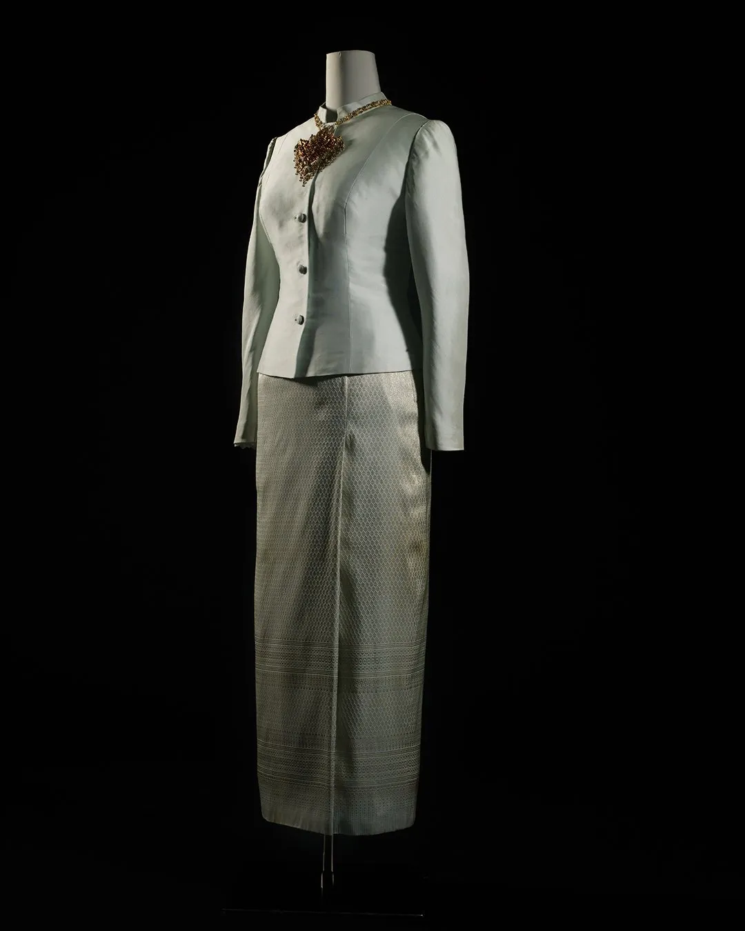 A silver white version of the Amarin traditional Thai dress on display at the Queen Sirikit Museum of Textiles.