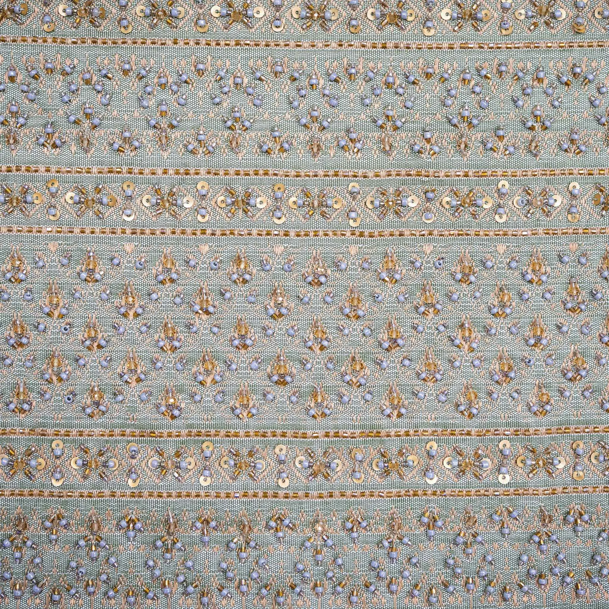 A close-up shot of the sequins and beads on the Chakri Thai dress