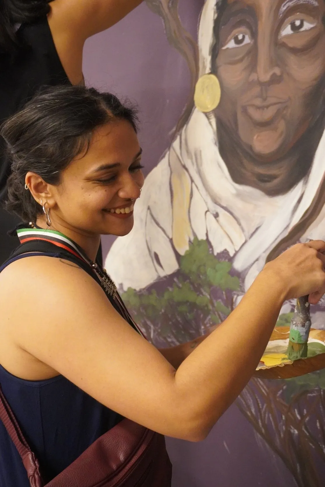 Mural painted by the Fearless Collective at the Women and Gender Pavilion at COP28