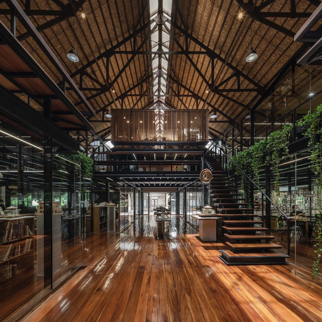 Interior shot of the Rabindhorn Building. Its traditional gabled roof, long used in Thailand for passive cooling, has a skylight ridge that allows for natural lighting