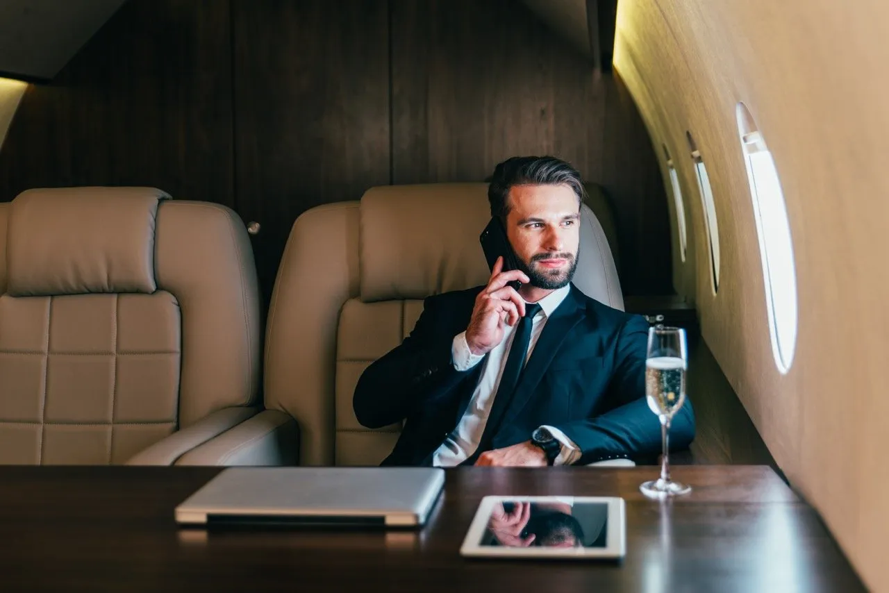 A businessman flying a private jet