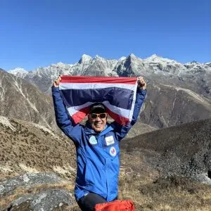 Vitidnan Rojanapanich on the summit of Mount Yasa Thak