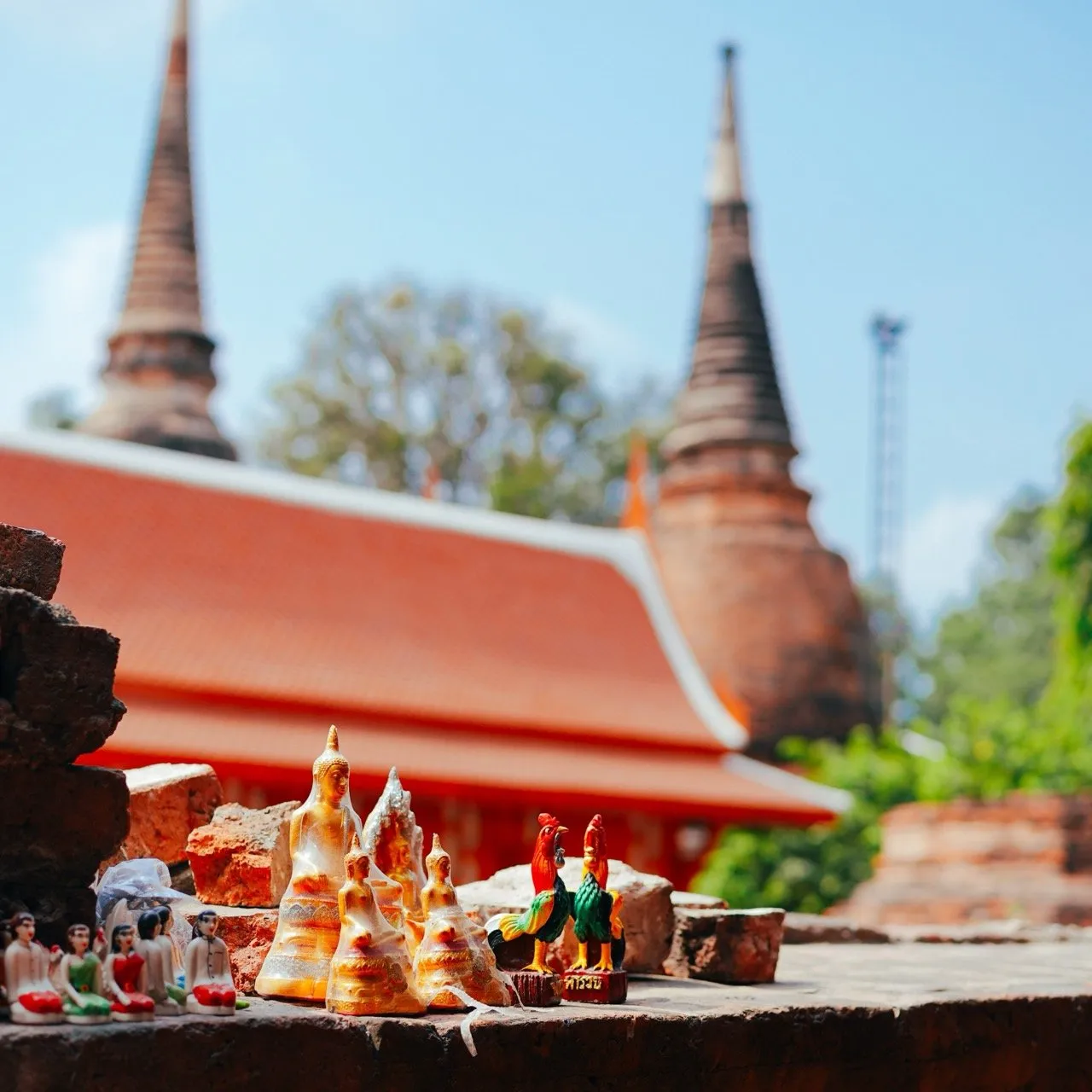 Various small statues that are presented to pay respect