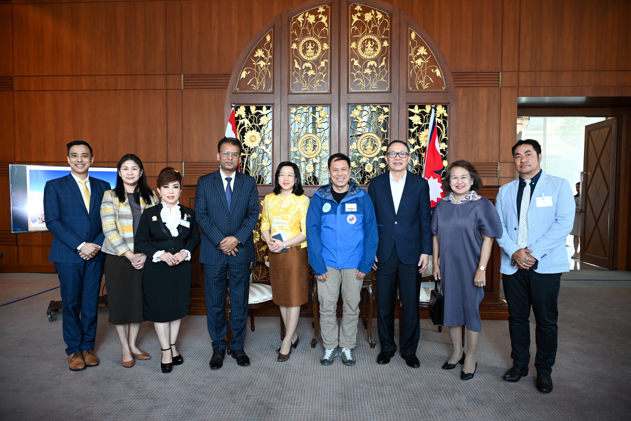 Thai and Nepalese dignitaries celebrate Vitidnan Rojanapanich's achievements.