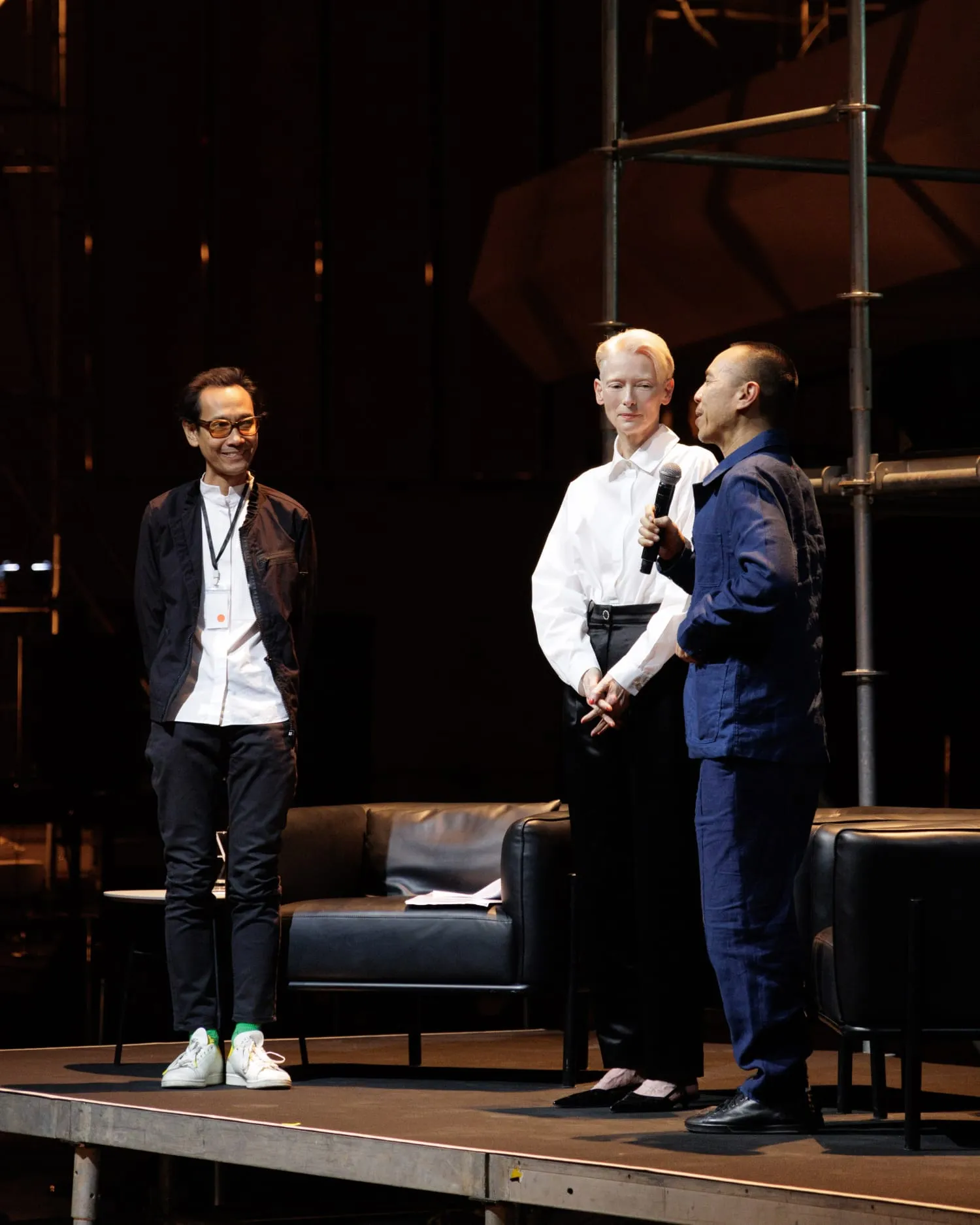 Left to right: Kong Rithdee, Tilda Swinton, and Apichatpong Weerasethakul