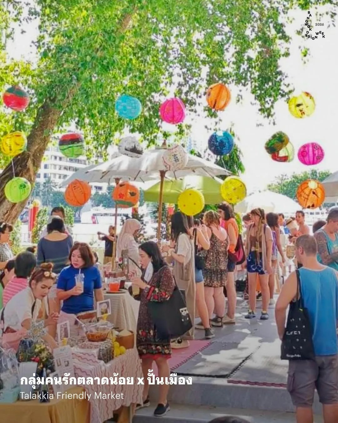 BKKDW2026 activity depicting a lively craft and food market along the Chao Phraya River