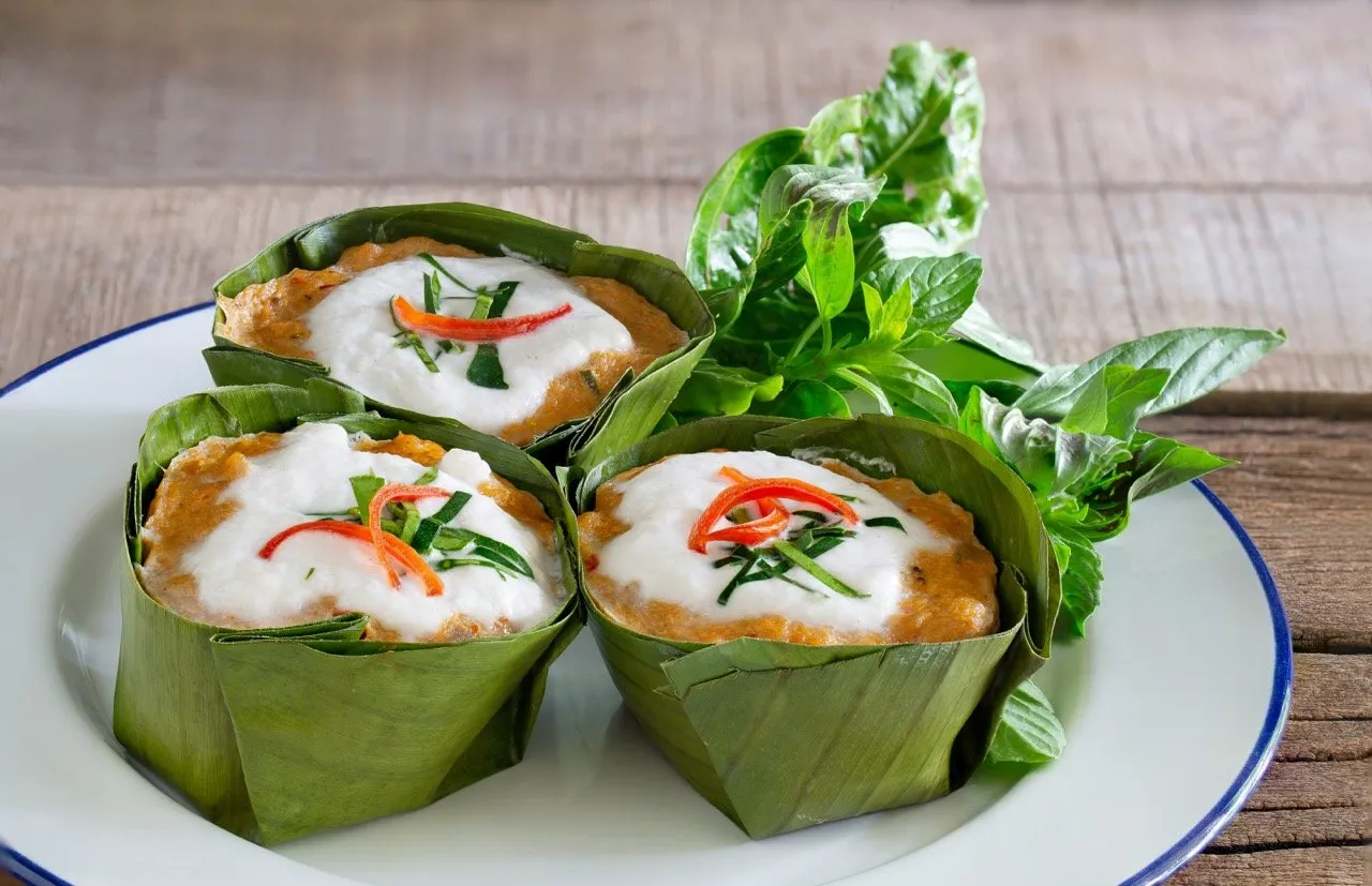 Steamed fish with red curry paste and coconut milk mixture or Hor Mok Pla