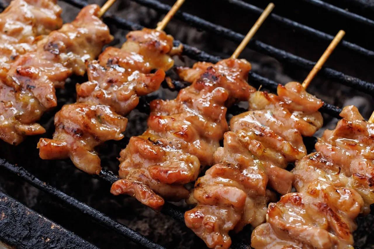 Thai-style grilled pork skewers or Moo Ping on the grill