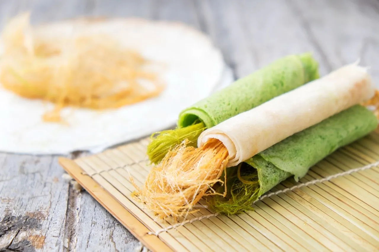 Thai-style cotton candy wrapped in crepe-like roti or Roti Sai Mai