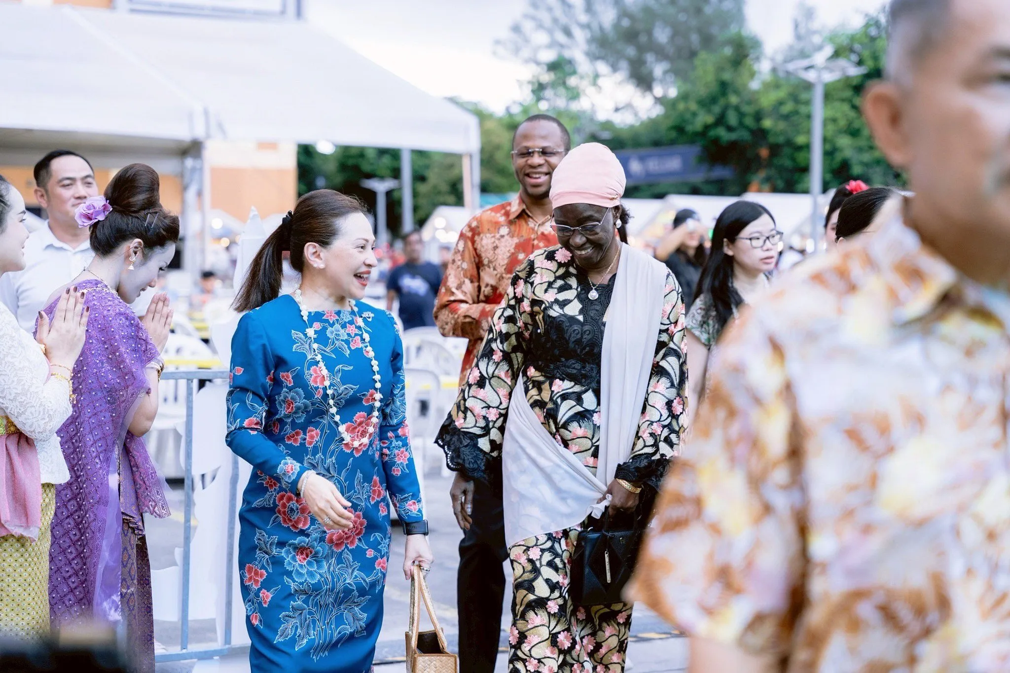 H.E. Lada Phumas, Ambassador of Thailand to Malaysia, chatting to H.E. Koumba Diop, Ambassador-designate of the Republic of Guinea to Malaysia, at Malaysia Premier Songkran Festival 2025