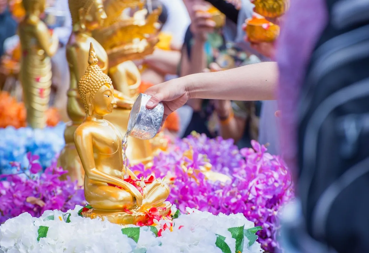 Bathing Buddha is another tradition during Songkran festival where Thais pour water over Buddha statues to invite peace and prosperity into their lives