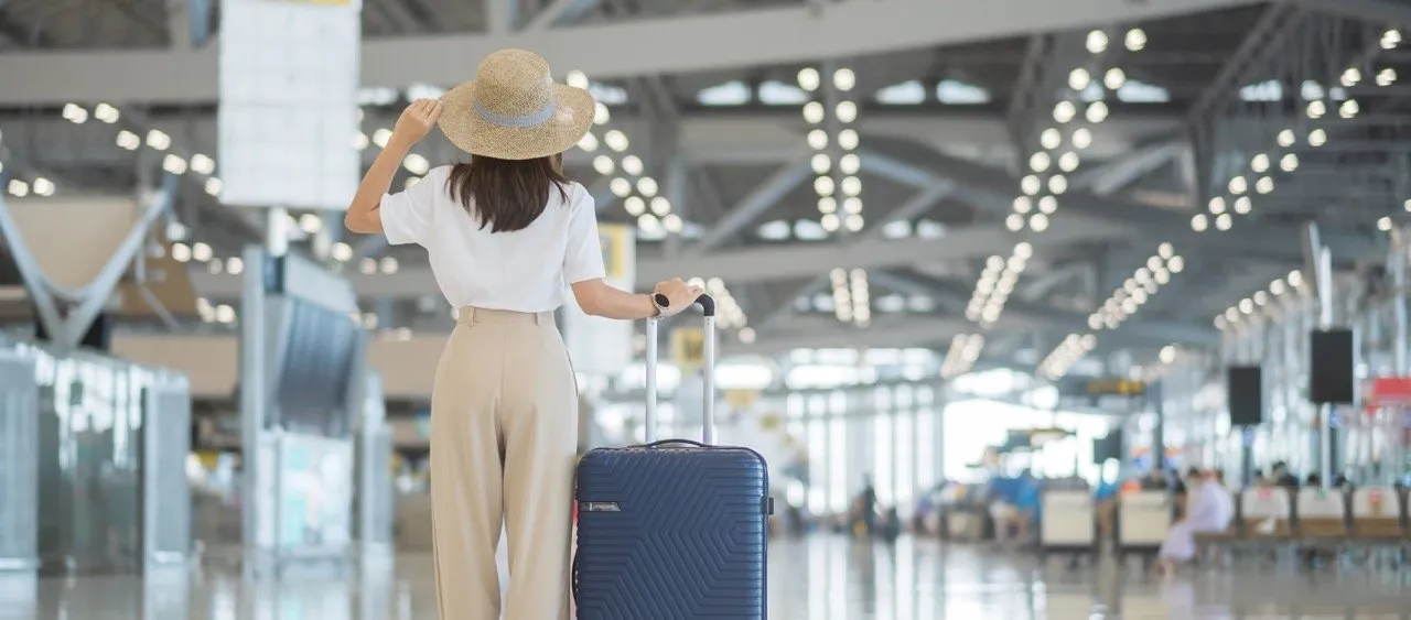 A lady arriving at the Suvarnabhumi Airport in Thailand