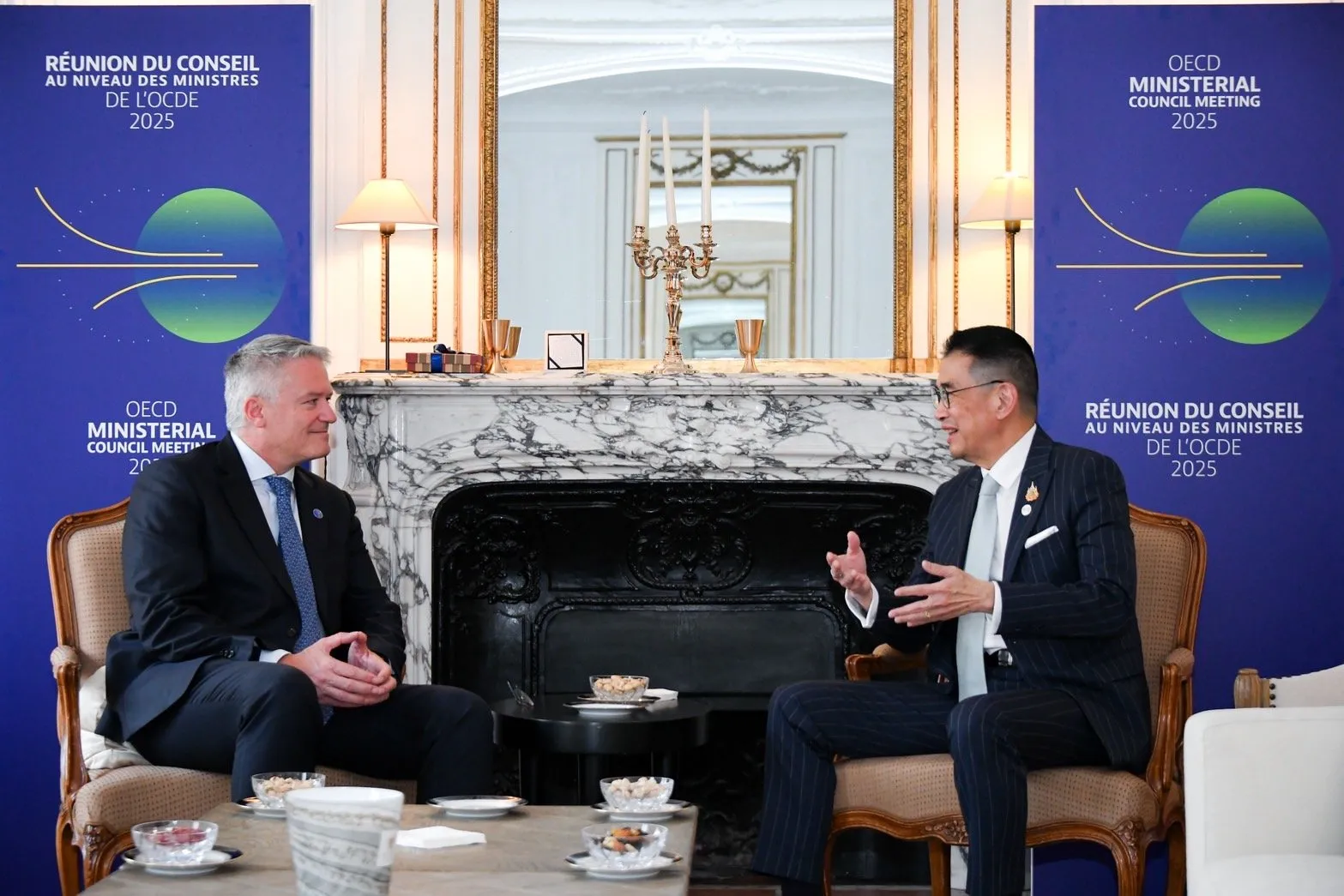 OECD Secretary General Mathias Cormann speaking to Foreign Minister Maris Sangiampongsa