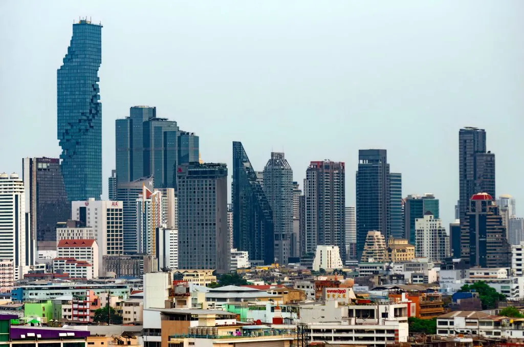 Skyline of Bangkok at dusk with the King Power MahaNakhon from the GenZ Bar and Bistro in Chinatown.
