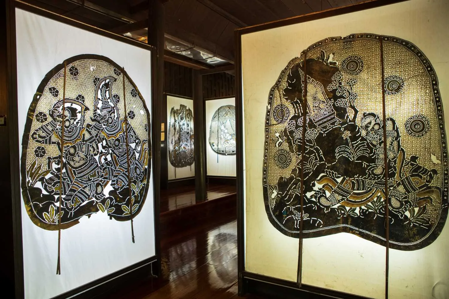Large-format shadow puppets carved from treated cowhide
