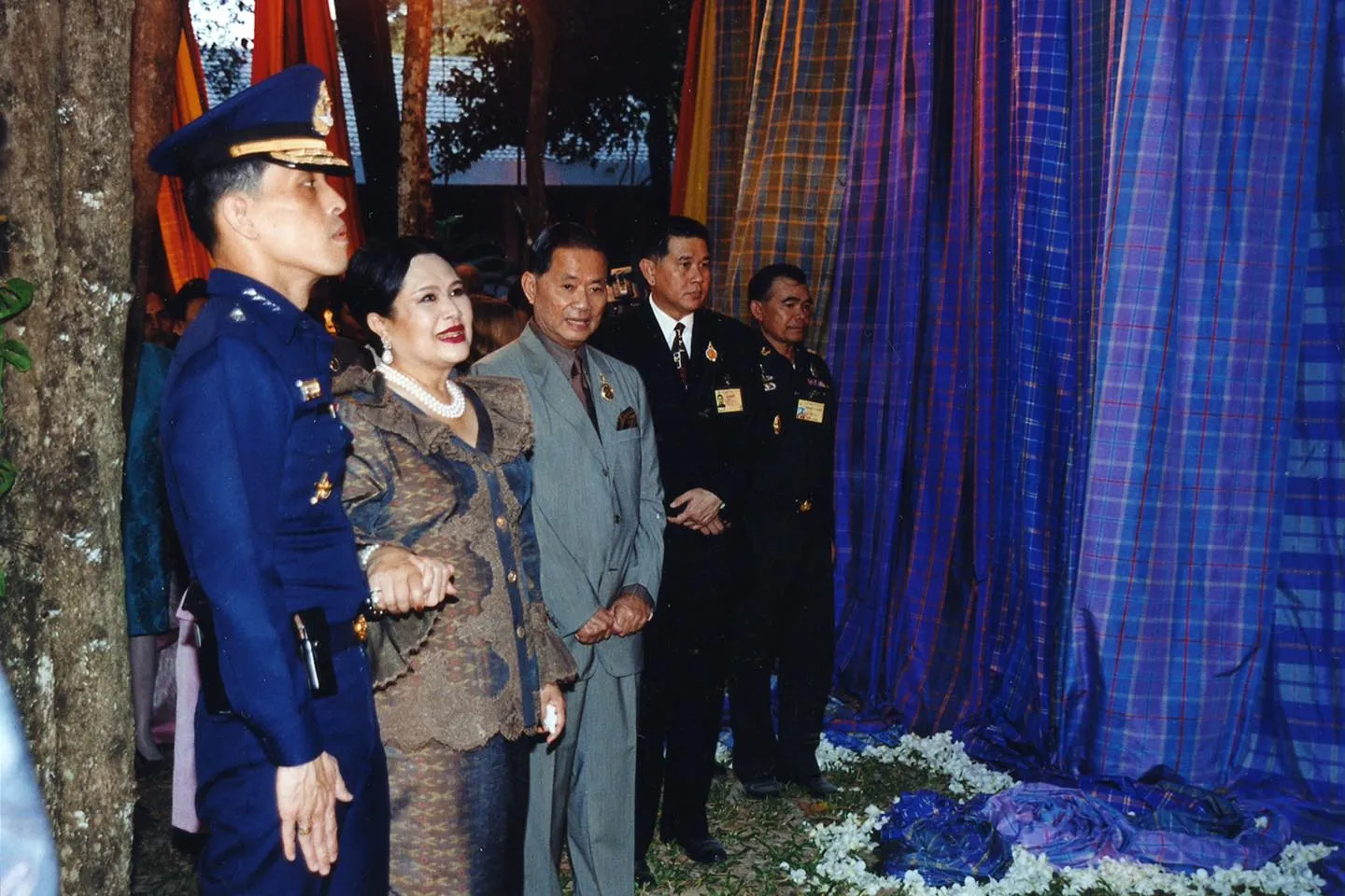 A picture of Queen Sirikit, the Queen Mother with His Majesty King Maha Vajiralongkorn Phra Vajiraklaochaoyuhua (Rama X)