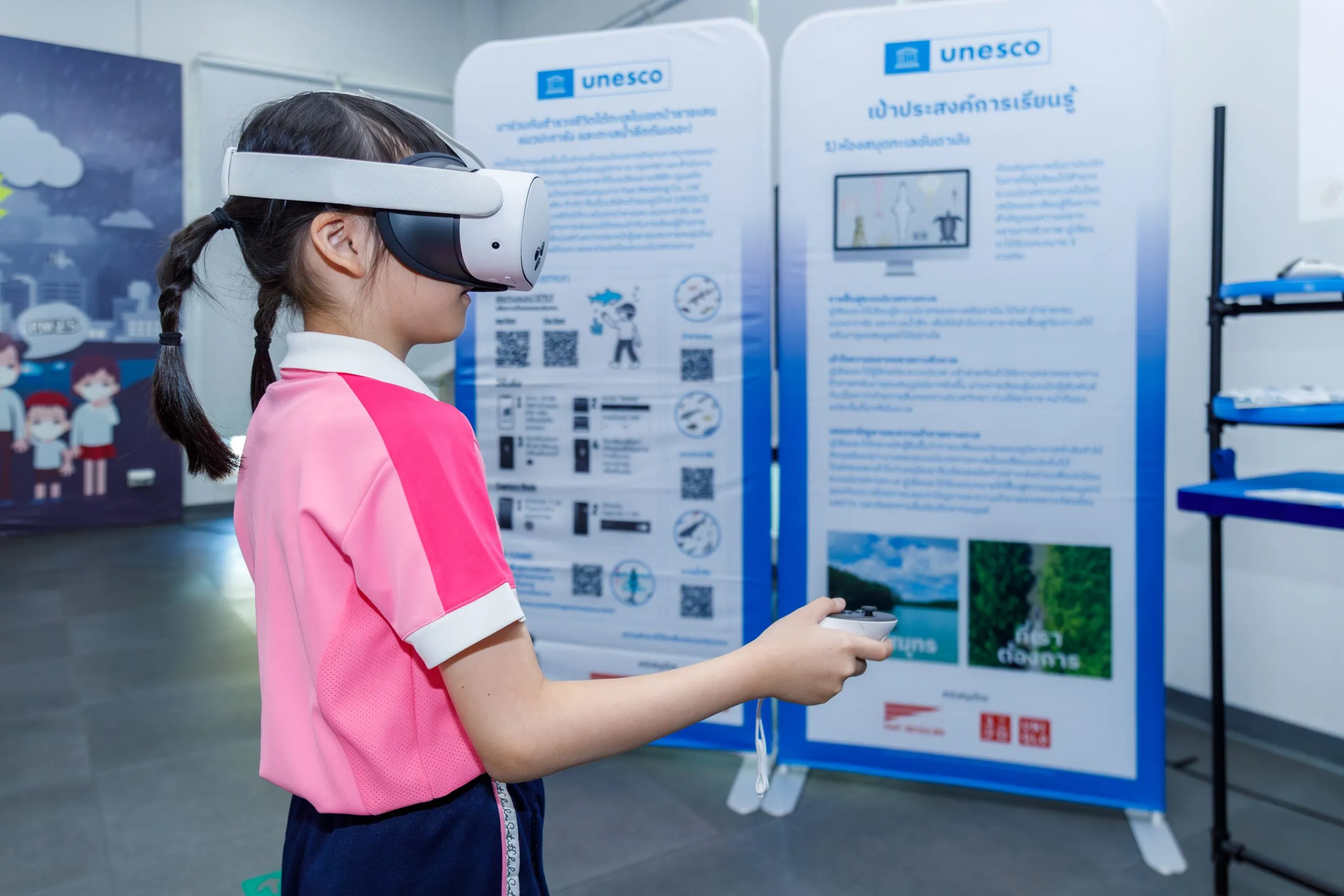 a young girl wearing a vr headset in an exhibition hall.