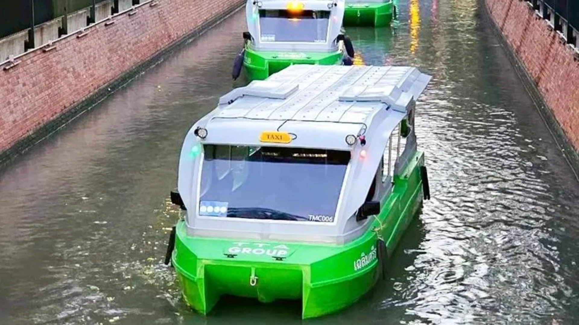Electric boats in the canal in Bangkok
