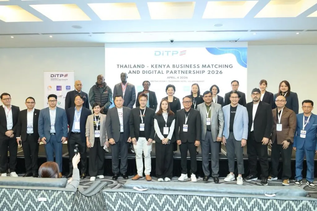 Thai and Kenyan delegates pose before a white corporate backdrop at the Trademark Hotel for a group photo on April 4th, 2026.