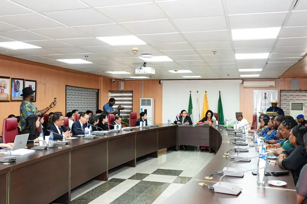 Thai and Nigerian delegations meet around a conference table during bilateral talks in Abuja.