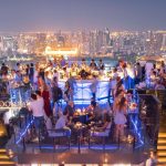 Moon Bar at Banyan Tree Bangkok overlooks the Bangkok skyline at night.