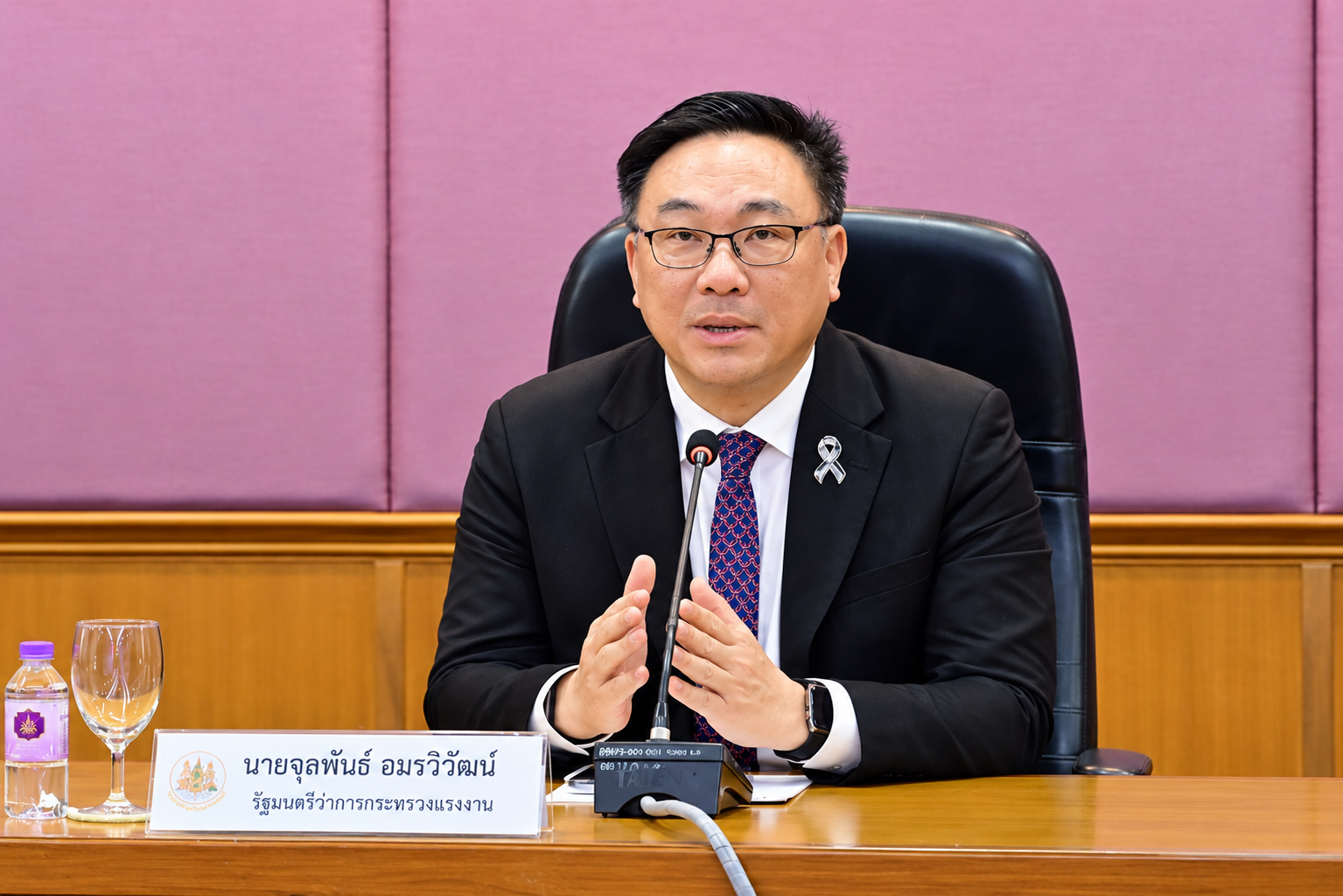 Julapun Amornvivat, Thailand’s Labour Minister, speaks at a Ministry of Labour meeting.