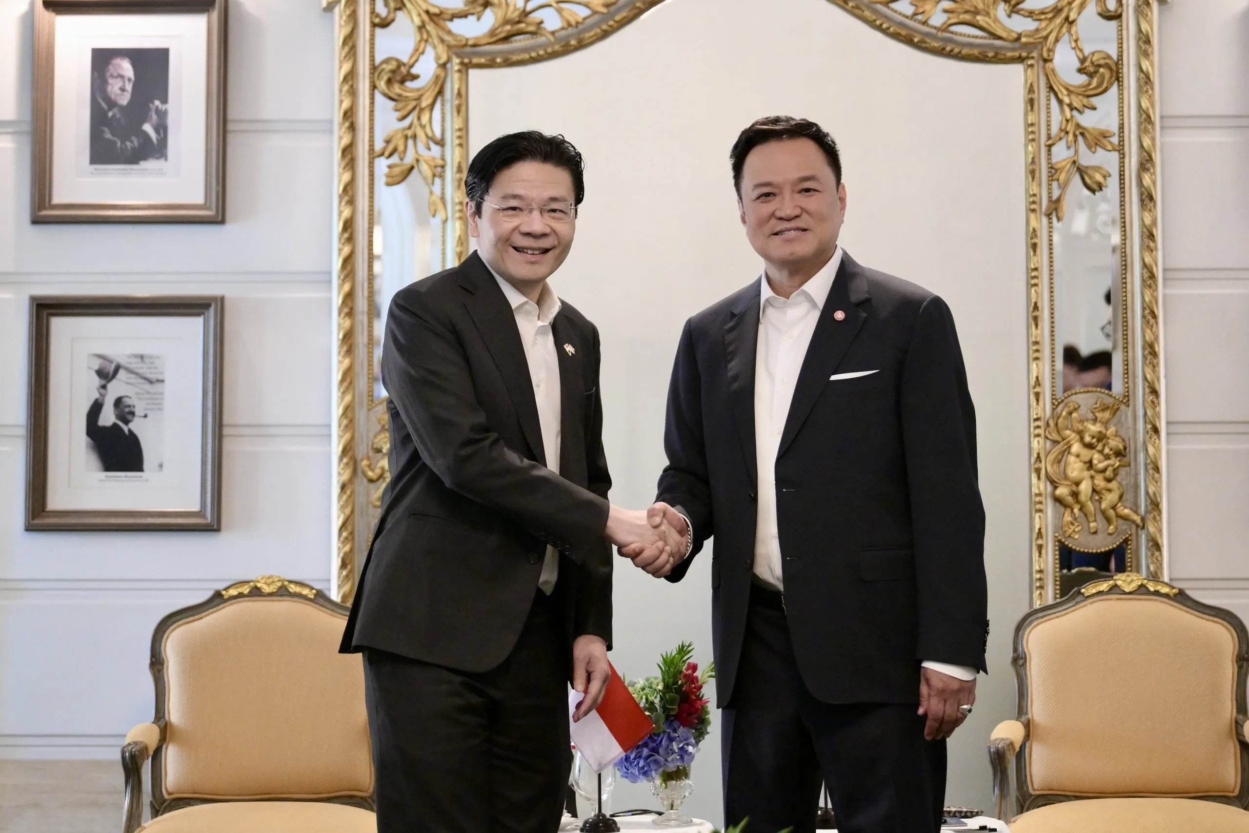 Thailand and Singapore leaders shake hands during the 5th Thailand-Singapore Leaders’ Retreat in Bangkok.
