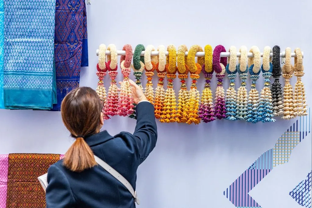 The Thailand booth at the Headquarters of the IMF and World Bank Group in Washington, D.C. featured Thai silk and phuang malai or flower garlands.